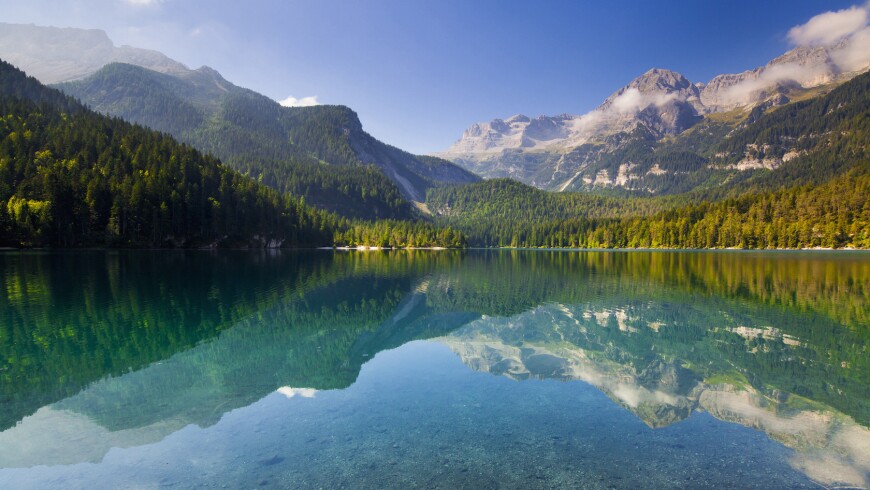 A landscape of a lake and mountains