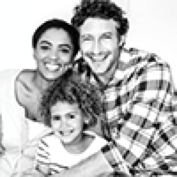 A photo of parents with their child